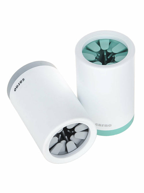 Pet paw cleaner in use on dog paw