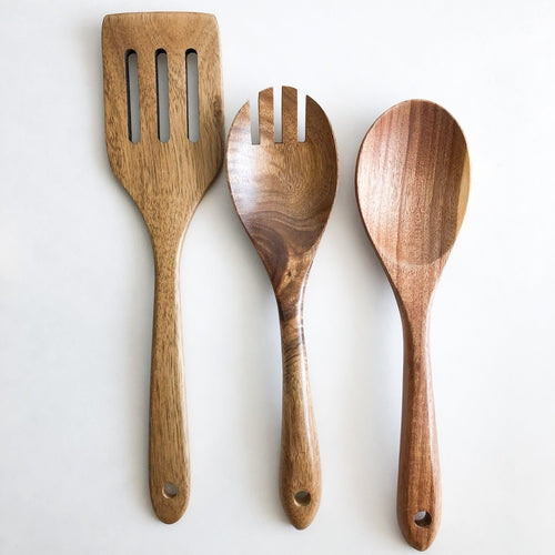 Acacia wood utensils displayed in kitchen
