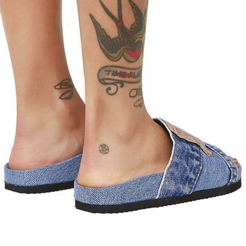 Denim flat slide sandal sole detail