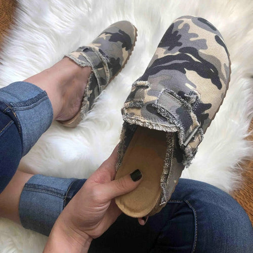 Canvas loafer worn on foot