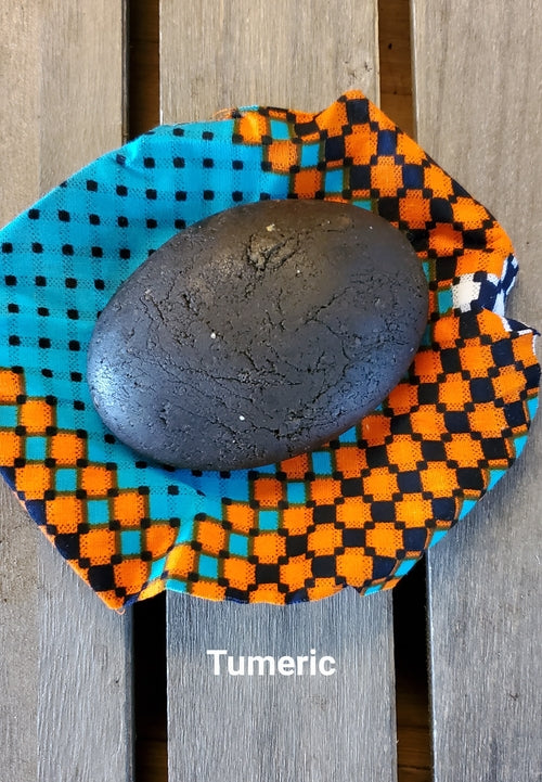 Herbal African black soap texture close-up