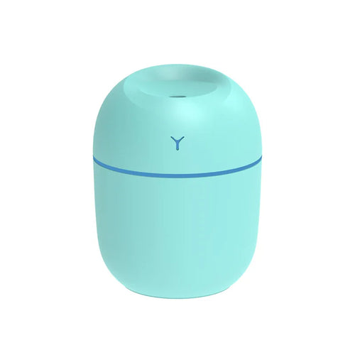 Portable humidifier in use on desk